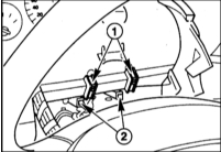 6. Нажмите на верхнюю часть боковины рулевого колеса вниз и зафиксируйте